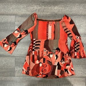 Nygard size medium, warm colors, unique pattern on or‎ off shoulder blouse top
